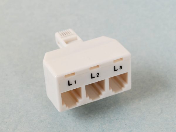 Telephone Adaptor, one plug to three jacks 6 pins 4 contacts, White